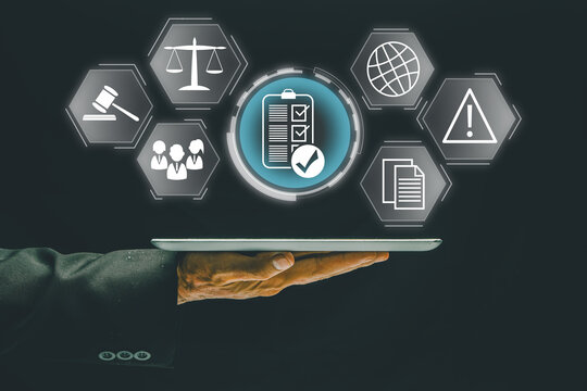 Businessman presenting digital compliance and regulation icons, symbolizing modern business technology and legal concepts.