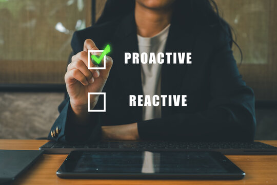 Businesswoman selecting proactive option on virtual screen, symbolizing strategic decision-making in a corporate environment.