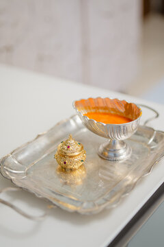 haldi and sindoor in a silver tray
