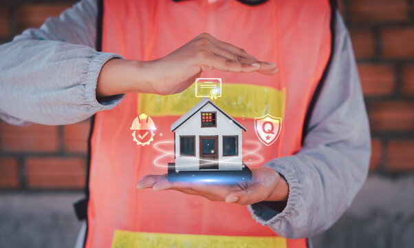 Construction worker hands protecting house model with virtual safety helmet, quality shield, and warranty certificate icons, Asset Investment Risk management Compliance, Property insurance