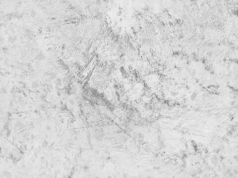White concrete wall texture with rough plaster surface background. Grunge vintage style white wall with distressed abstract concrete pattern.