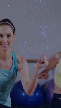 Vertical video: Coach starting side steps leading fitness class copying lunges, overlaying moves