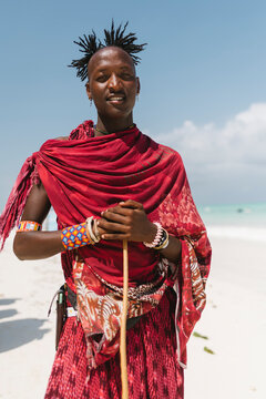 Maasai warrior dressed in traditional clothing in Zanzibar.