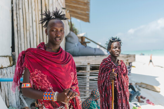 Two Maasai men looking at the camera.