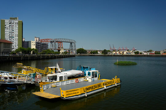 BUENOS AIRES, ARGENTINA - JANUARY 15 2026 - river garbage removal in La Boca popular destination with colourful houses and pedestrian street,