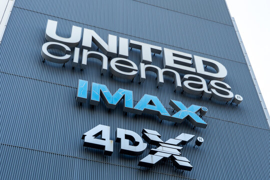 NERIMA, TOKYO, JAPAN - APRIL 19, 2026: Branding logos for United Cinemas, IMAX, and 4DX theater systems displayed together at a modern cinema complex in Nerima-ku, Tokyo.