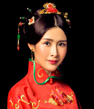 Asian women in red ancient costumes