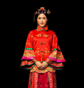 Asian women in red ancient costumes
