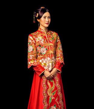 Asian women in red ancient costumes