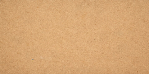 Fototapeta premium Texture of a rough kraft paper, the warm earthy tones create an inviting background. 