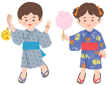 縁日を楽しむ浴衣を着た子供たち