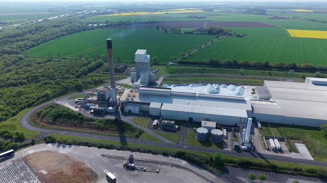 High angle aerial drone view of a large industrial glass manufacturing facility and factory in Goole United Kingdom