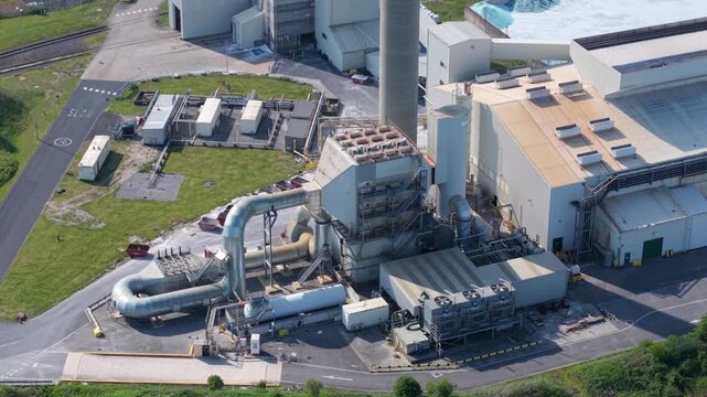 High angle aerial drone view of a large industrial glass manufacturing facility and factory in Goole United Kingdom