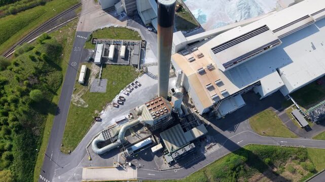 High angle aerial drone view of a large industrial glass manufacturing facility and factory in Goole United Kingdom