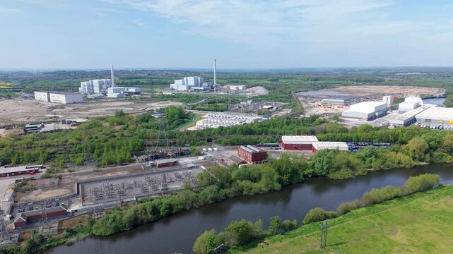 Aerial view of twin energy from waste power plants and industrial infrastructure in Ferrybridge, UK.