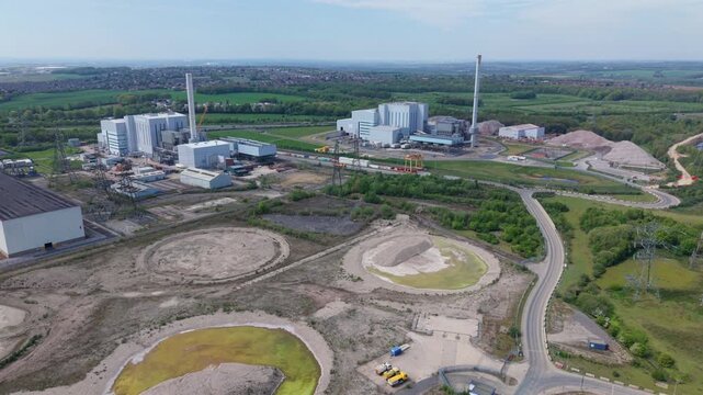 Aerial view of twin energy from waste power plants and industrial infrastructure in Ferrybridge, UK.