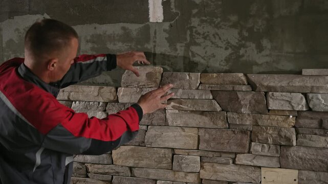 Mason Methodically Placing And Measuring Stones To Ensure Perfect Alignment And Aesthetic Appeal