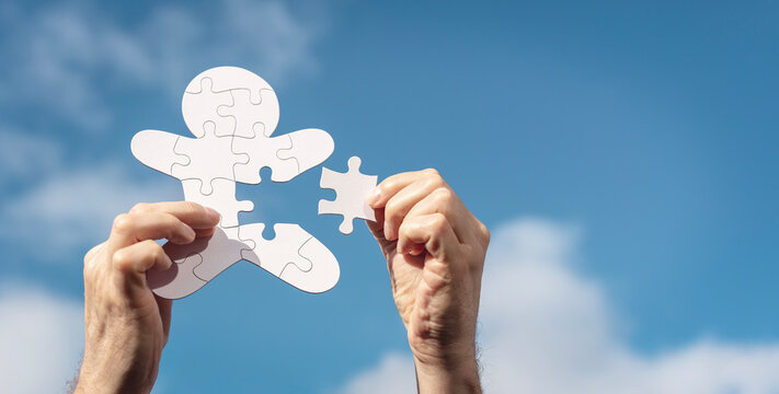 Missing jigsaw puzzle piece in human team employee or personal fulfilment background