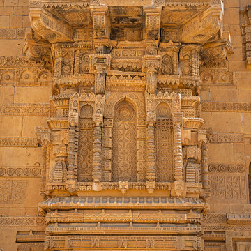 Detail view of exterior of medieval sandstone tomb of Jam Nizamuddin II in UNESCO World Heritage Makli necropolis, Thatta, Sindh, Pakistan