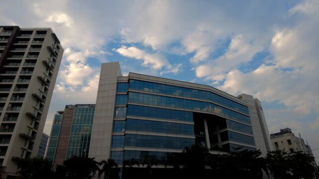 Timelapse of Fast Moving Clouds Over Glass Office Buildings in Bandra Kurla Complex Mumbai India