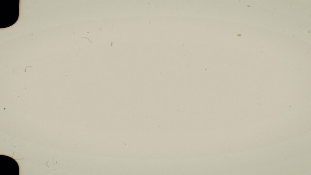 16mm film sprocket frame with vintage film strip overlay and scratches texture