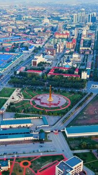 Vertical video. Grozny, Russia. Memorial. Panorama of the city center from the air. Time after sunset. Drone footage. Rich colors