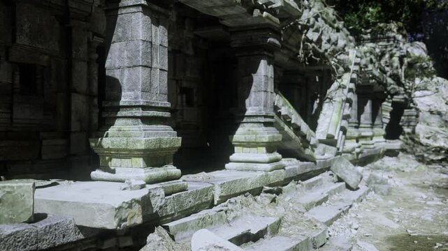 moss covered stone colonnade under sunlight, carved pillars and scattered rubble, dense jungle encroaching, cool green tones and textured limestone surfaces