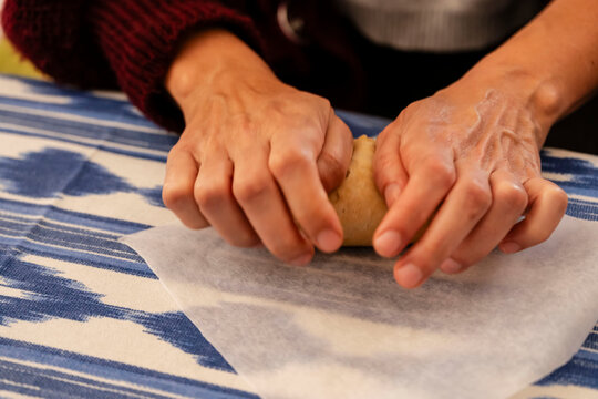 kneading sourdough for typical Mallorcan sailor biscuits, Manacor, Mallorca, Balearic Islands, Spain