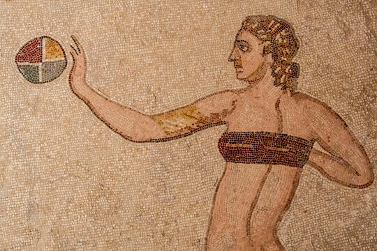 Woman from ancient Rome training in a bikini with a ball,  &ldquo;Hall of the Bikini Bathers&rdquo;, Roman Villa of Casale, Piazza Armerina, Sicily, Italy, Europe