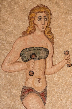 Roman woman in underwear lifting weights, &ldquo;Hall of the Ten Girls&rdquo; , Roman Villa of Casale, Piazza Armerina, Sicily, Italy, Europe