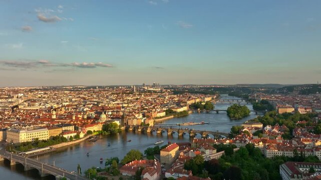 Prague historic bridges above Vltava river. Prague aerial perspective with Charles Bridge. Prague Charles Bridge districts. Prague cityscape with old architecture.