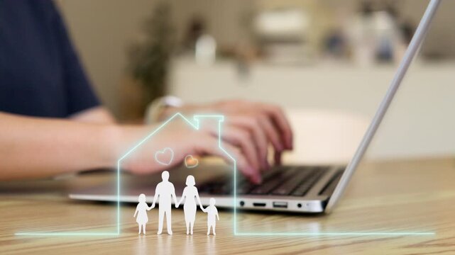 Digital home and family insurance protection concept with person using laptop and glowing house icon on wooden table