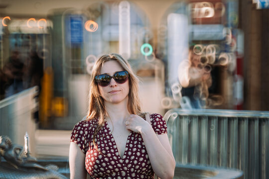Zurich, Switzerland, April 25, 2026. Portrait of a young woman in sunglasses looking at the camera in the city