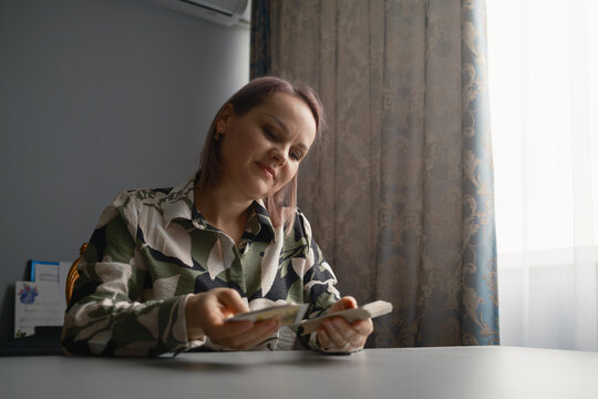 Woman doing a tarot card reading at a table for spiritual guidance and future insight