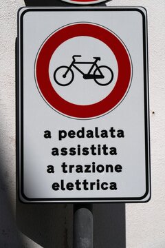 No entry for electric bicycles and pedal assisted electric bicycles, prohibitory sign. Road sign in Corato, Italy.