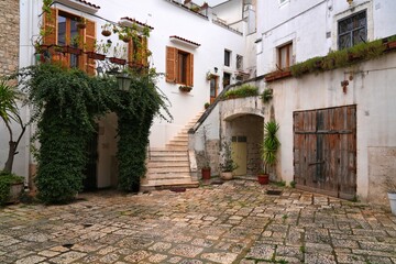 Obraz premium Rutigliano town in Italy. Apulia region of Southern Italy. Rainy street view in Italian town.