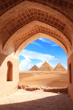 Creative collage - View of sand dunes and pyramids through stone arch. Ancient arch at entrance to Great Pyramids in Giza pyramid complex (Giza Necropolis), Egypt. Travel, resort, vacation concept