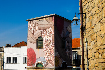 Artistic mural on building facade with floral motifs in Porto historic district, Portugal, Porto, 17 October 2025 © were