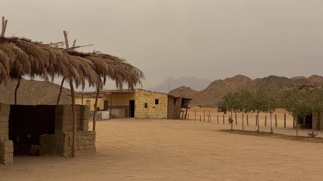 Serene Traditional Market Shelter Surrounded By Adobe Constructions And Tranquil Open Courtyard