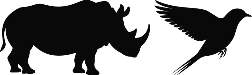 Rhinoceros and flying bird silhouettes set, wild animal and bird shapes isolated on light background design resource © SreePoreshChandra