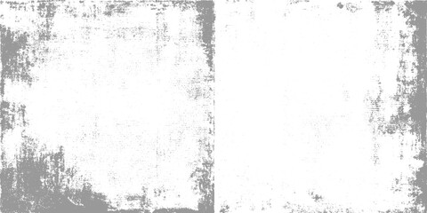 Fototapeta premium Grayscale distressed paper texture with subtle dot pattern and rough edges grunge background