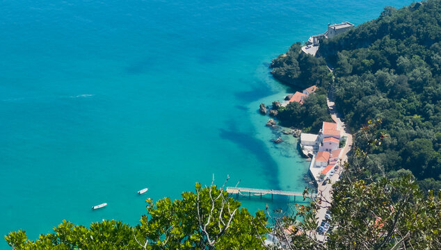 Panoramic aerial view of Arrabida beach. Rocky seascape. Creiro beach. Setubal region, Atlantic Ocean, Portugal