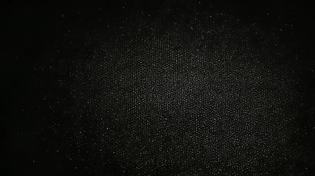 暗闇に揺らめく粒子ノイズの抽象テクスチャ背景