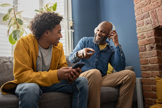 Father and son bonding over music together