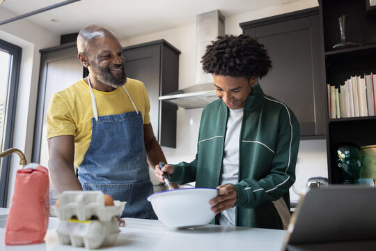 Cheerful Family Cooking Moments in the Kitchen