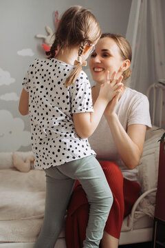 Mother and child spending happy time together at home