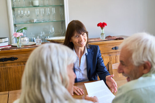 Retirement Planning And Financial Protection: Senior Couple Consulting With Advisor For Long-Term Security And Estate Management