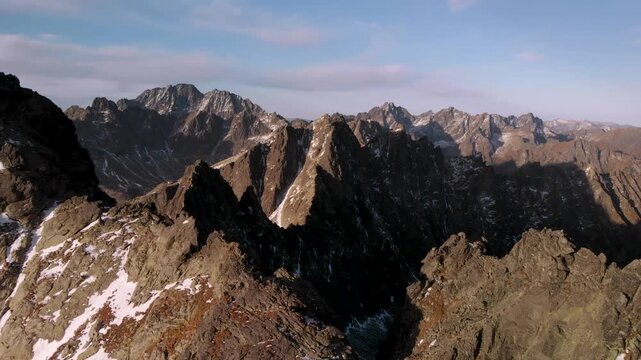 Flying over a gap in a mountain ridge in Tatra national park, Slovakia