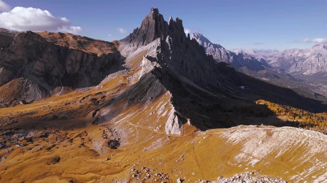Flying towards Croda da Lago mountain ridge in Dolomites, Italy. 
