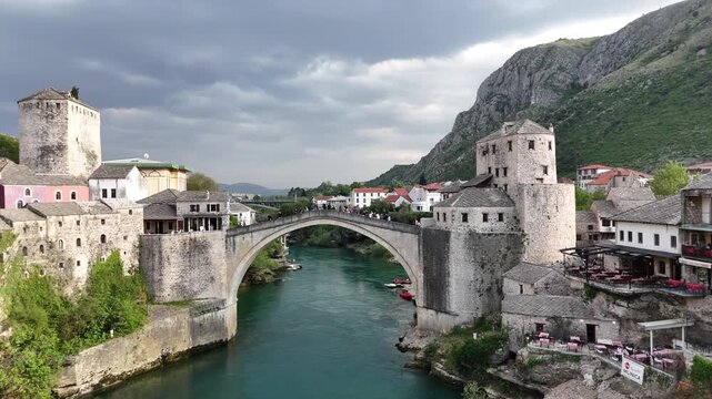 Cinematic aerial view of Stari Most (Old Bridge) in Mostar, Bosnia and Herzegovina.